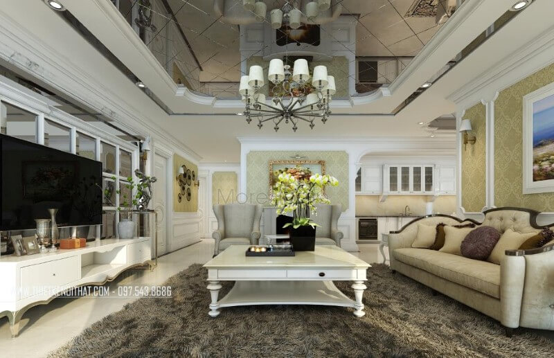 Nội thất phòng khách chung cư tân cổ điển sử dụng hai tone màu chủ đạo là màu trắng và vàng nâu nhẹ cổ điển mang lại sự hài hòa và ấn tượng khu vực tiếp khách của gia chủ Mẫu thiết kế nội thất phòng khách cao cấp